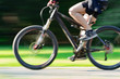 © astrosystem - Riding bicycle - blurred motion, fast driving.