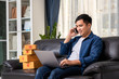 © tong2530 - Online sales young start small business in a cardboard box at work. The seller prepares the delivery box for the customer, or ecommerce. Work from home concept.