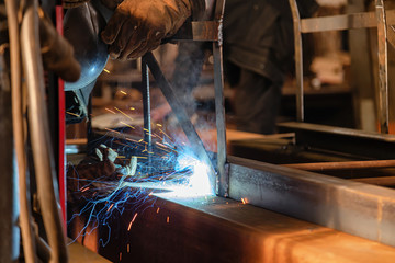 Canvas Print - Welding of metal structures using semi-automatic weld