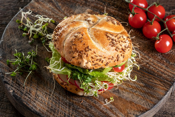 Wall Mural - Veggie burger with sprouts and microgreens
