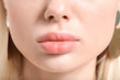 © Pixel-Shot - Beautiful young woman with pink lipstick, closeup