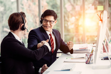 Wall Mural - operator with hands-free headset working in the office