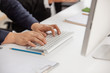 © nikomsolftwaer - Male hands or men office worker typing on the keyboard. people and technology concept - close up of african american female hands typing on keyboard