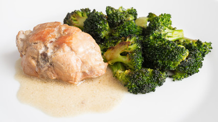 Wall Mural - rabbit saddle braised with sour cream and white wine garnished with broccoli