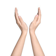 Wall Mural - woman against white background, closeup on hands