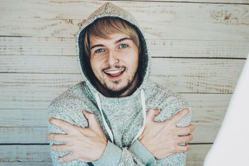 Funny and casual portrait of an attractive young man