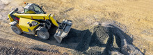 Excavator On An Construction Site From Above Panorama