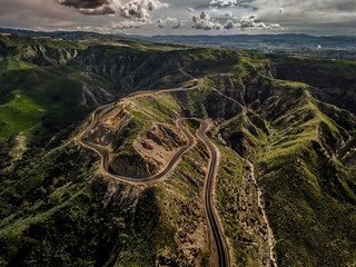 take a drive on a long winding road in a canyon with your family and friends