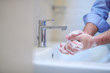 © .shock - coronavirus male wahing hands in bathroom