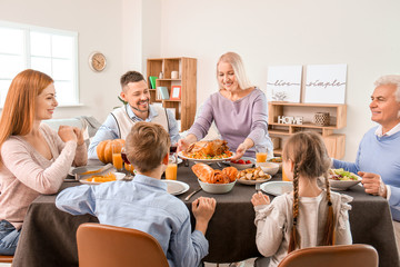 Family celebrating Thanksgiving Day at home