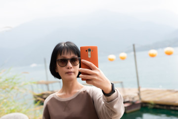 Wall Mural - Asian woman selfie