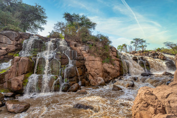 Wall Mural - small waterfall in Awash National Park. Waterfalls in Awash wildlife reserve in south of Ethiopia. Wilderness scene, Africa