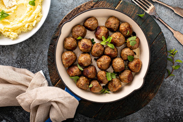 Wall Mural - Swedish meatballs cooked in a cast iron pan