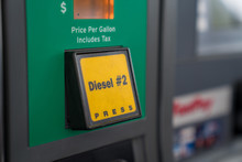 Green Diesel Fuel Button On Gas Pump At Gas Station