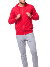 Sport Man In A Red Sports Suit With A Hood And White T Shirt .