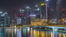 Esplanade Bridge And Downtown Core Skyscrapers In The Background Singapore Night Timelapse Hyperlapse