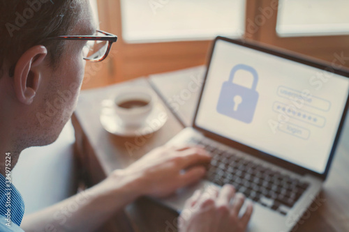 Fotografía data protection and internet security concept, user typing login and password on