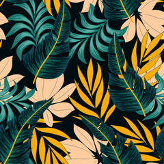  Original seamless tropical pattern with bright plants and leaves on a dark background. Beautiful seamless vector floral pattern. Modern abstract design for fabric, paper, interior decor.
