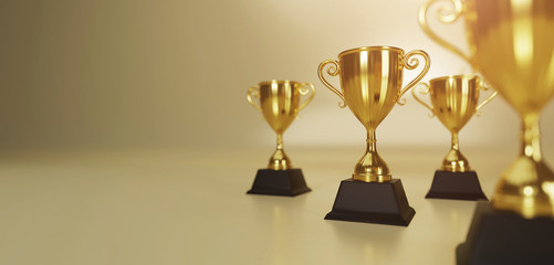 Wall Mural - golden trophy cup on gold background. copy space for text. 3d rendering.