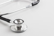 © cunaplus - Medical stethoscope isolated on white and copy space
