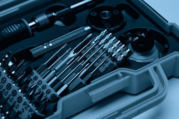 . A set of professional tools in a case for repairing phones, smartphones, computers and other office equipment.