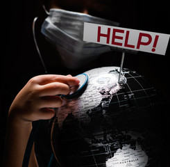 Wall Mural - hands of kid holding globe covid-19 pandemic infection disease concept