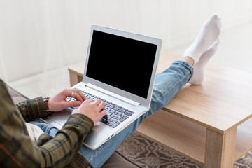 Close-up young man enjoying remote work