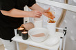 © rostyslav84 - Beautican takes massage gel in SPA salon