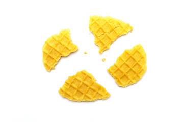 Wall Mural - Crumbs of waffle crisp butter flavor biscuits isolated on white background.