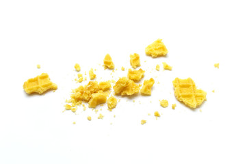 Wall Mural - Crumbs of waffle crisp butter flavor biscuits isolated on white background.