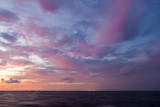 Fototapeta  - Long exposure sea and rocks at twilight