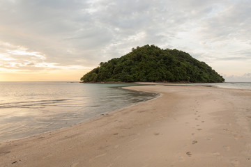 Wall Mural - Tropical island and paradise beach at sunset