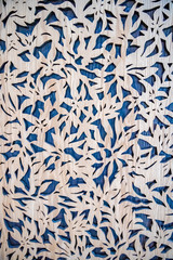 Wall Mural - carved wooden pattern on a blue treasure as interior decoration