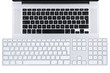 © evsafronov - Top view on a laptop and standart keyboard with flat buttons