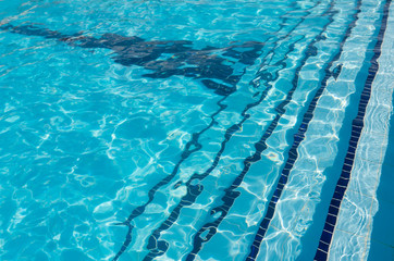 the texture of the crystal clear water in the pool. safe swimming. water in bright light