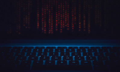 code and keyboard blue background ethical hacking concept