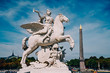 © Inti St. Clair - Angel on horse statue with Luxor Egyptian obelisk in the background at the Place de la Concorde in Paris, France