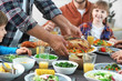 © Pixel-Shot - Family celebrating Thanksgiving Day at home