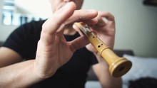 Male Musician Hands Playing On Recorder, Woodwind Wood Flute