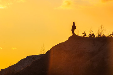 man at the top enjoying the sunset wanderlust happiness