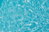 Fototapeta Sypialnia - Blue water ripple reflection in the swimming pool
