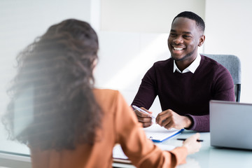 Two Businesspeople Talking With Each Other