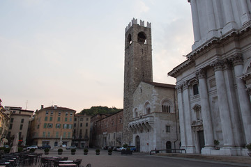 Broletto Palace with Tower of Pegol in Piazza Paolo VI, Lombardy, Italy.