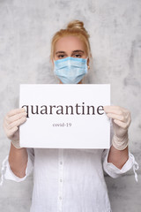 Wall Mural - Woman in quarantine for Coronavirus wearing protective mask and gloves.