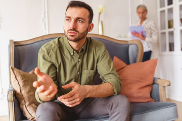 Sad male patient staring into the distance