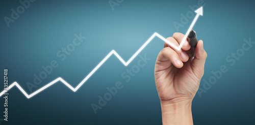 Cuadros en Lienzo Hand drawing chart, graph stock of growth