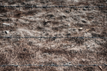 Boundary wire fence boundary line with natural area background