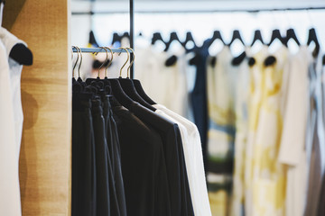 clothes on a rack in a store