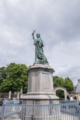 Statue of Pierre l'Ermite (Peter the Hermit) at Saint Michel square near Basilique Cathedrale Notre-Dame d'Amiens. Pierre l'Ermite was a priest of Amiens. Amiens, Somme, Picardie, France.