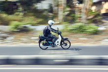 Fast Moving Moped With Panning Technique